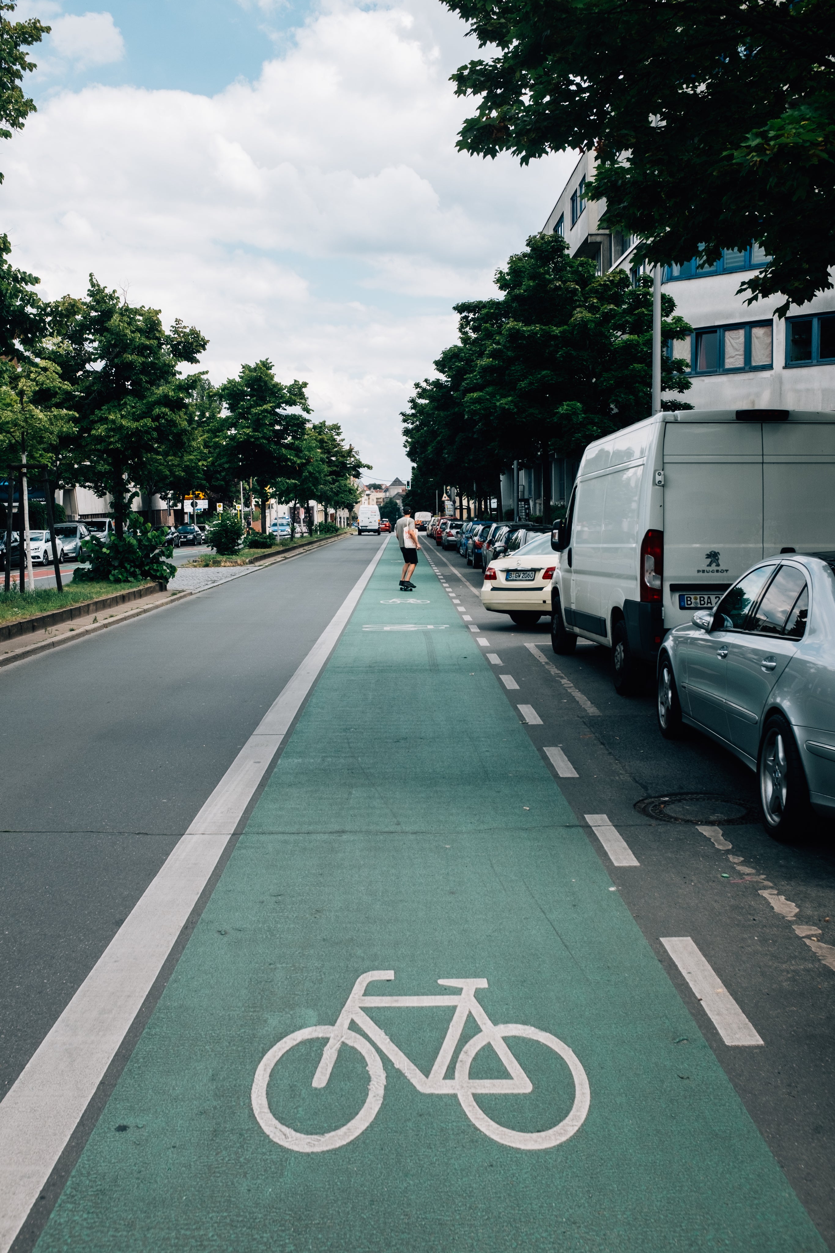 skateboarder-using-the-bike-lane-on-a-sunny-day.jpg